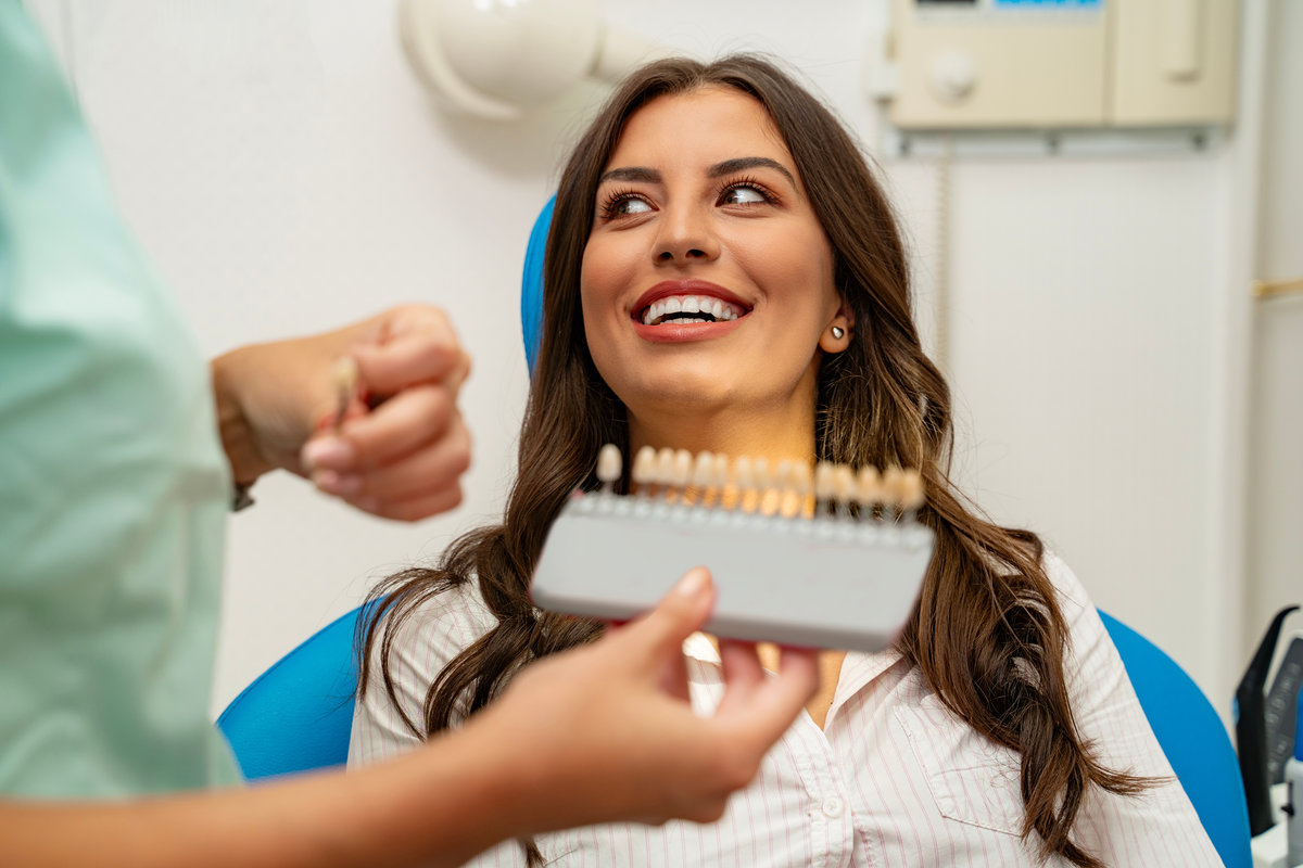 A young woman smiling with her metal-free fillings