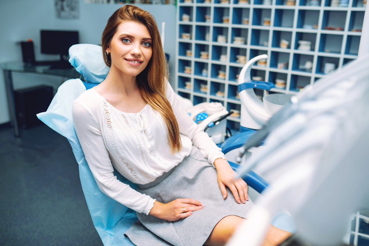 A young woman smiling with her metal-free fillings
