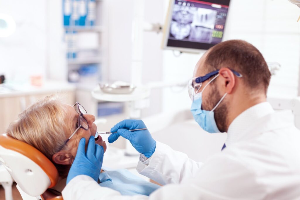 Dentist consulting with a patient about a dental crown procedure